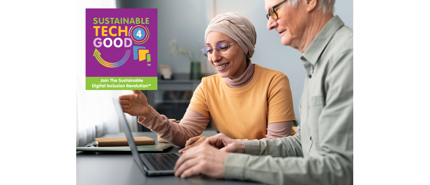 Woman of middle eastern descent showing a white elderly man how to use a laptop